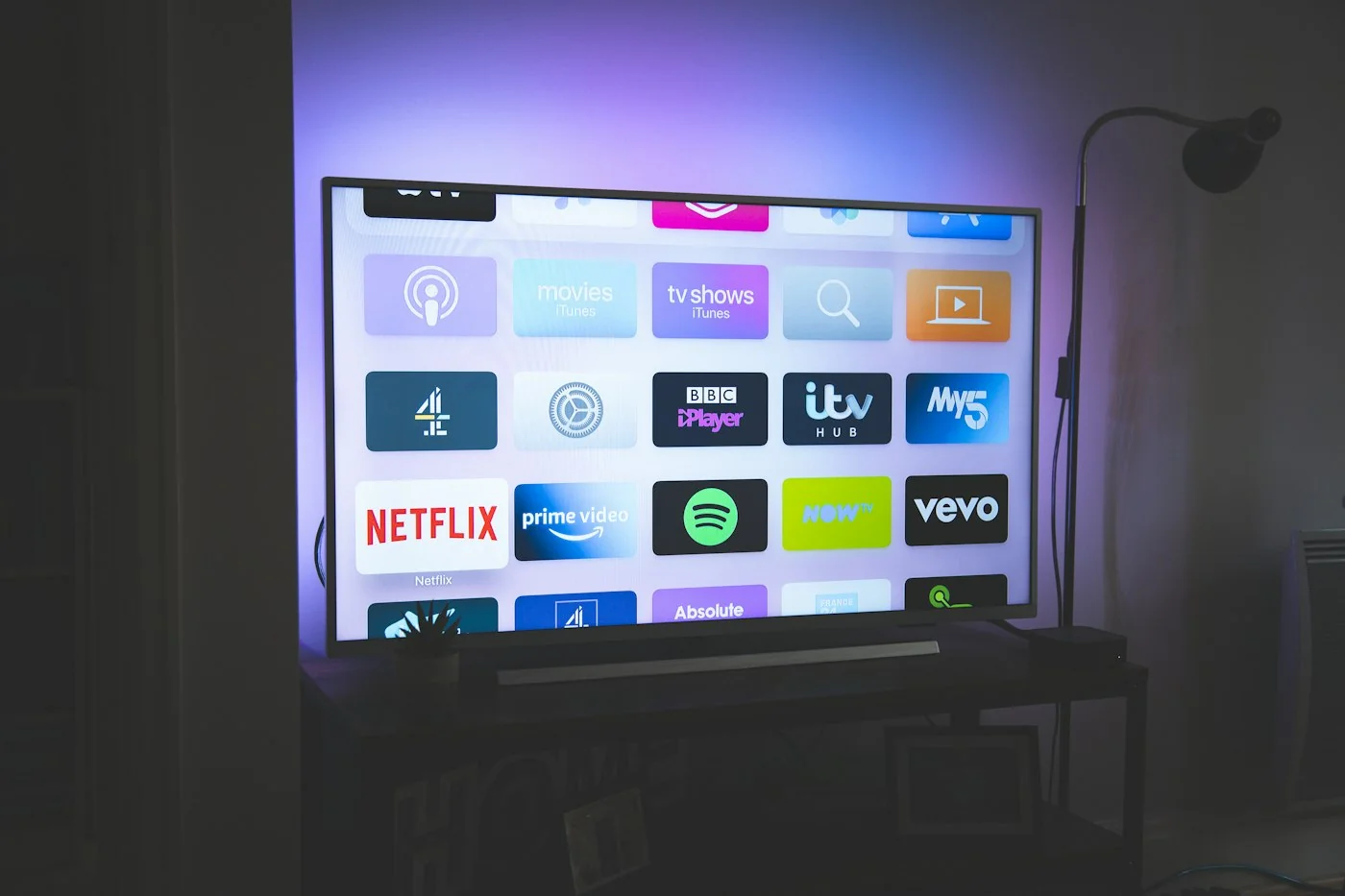 Premium smart TV setup displaying IPTV content in a modern living room